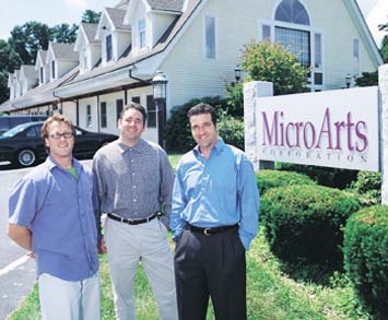 Peter Getman '90, Barrett McDevitt '85 and Michael DesRochers '86