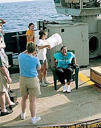 UNH diver getting water dumped on head