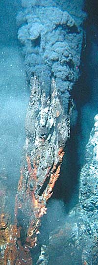 Underwater shot of a smoking mineral chimney