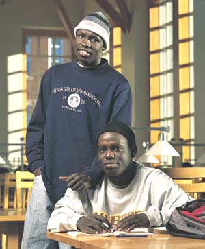 Moses Ajou and John Akok in Dimond Library